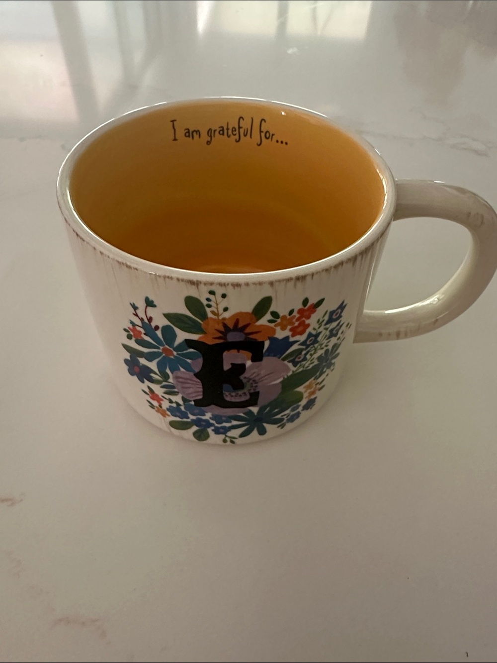 Natural Life Initial E Ceramic Mug with Yellow Interior and Floral Design